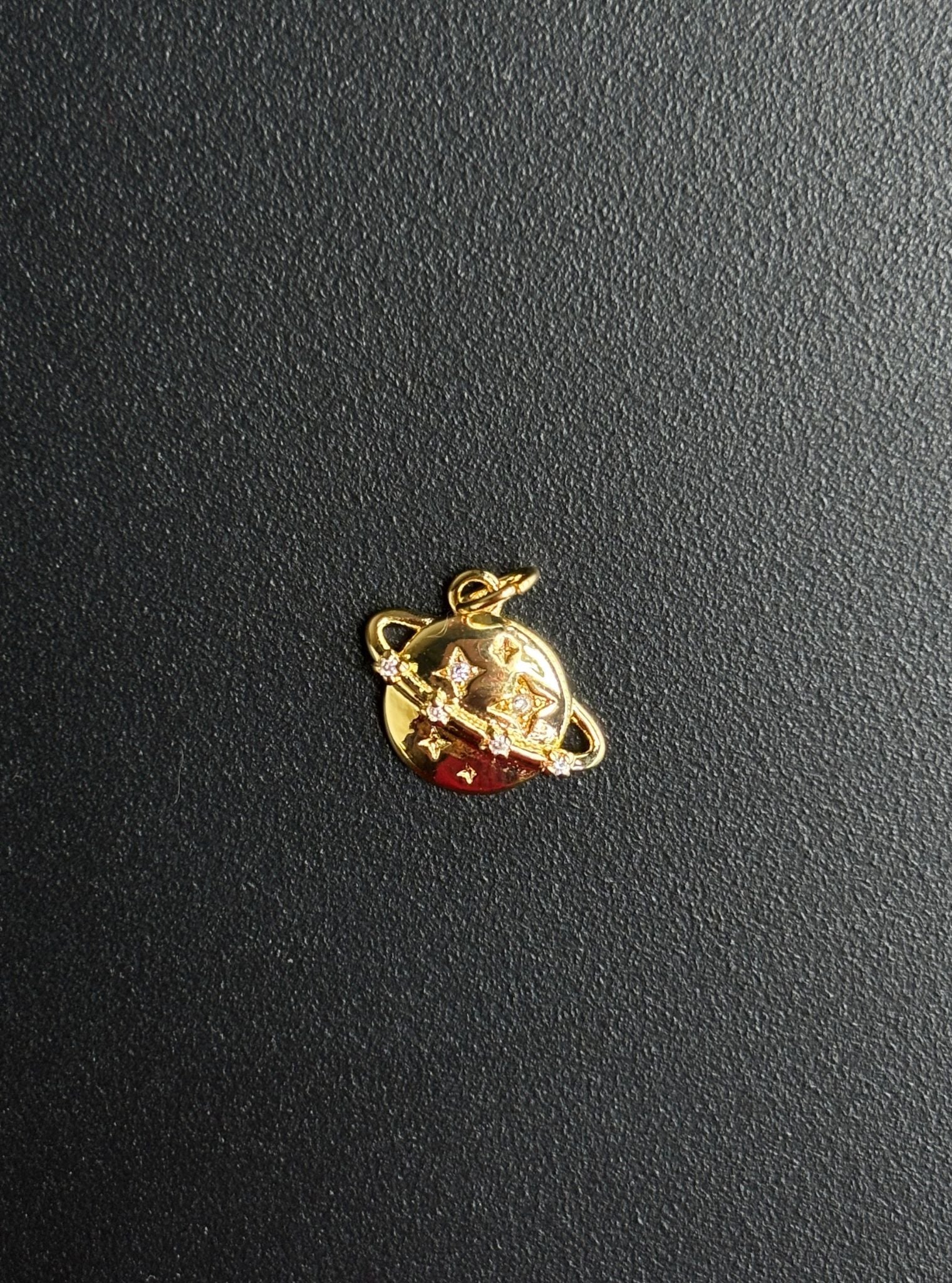 Saturn Charm