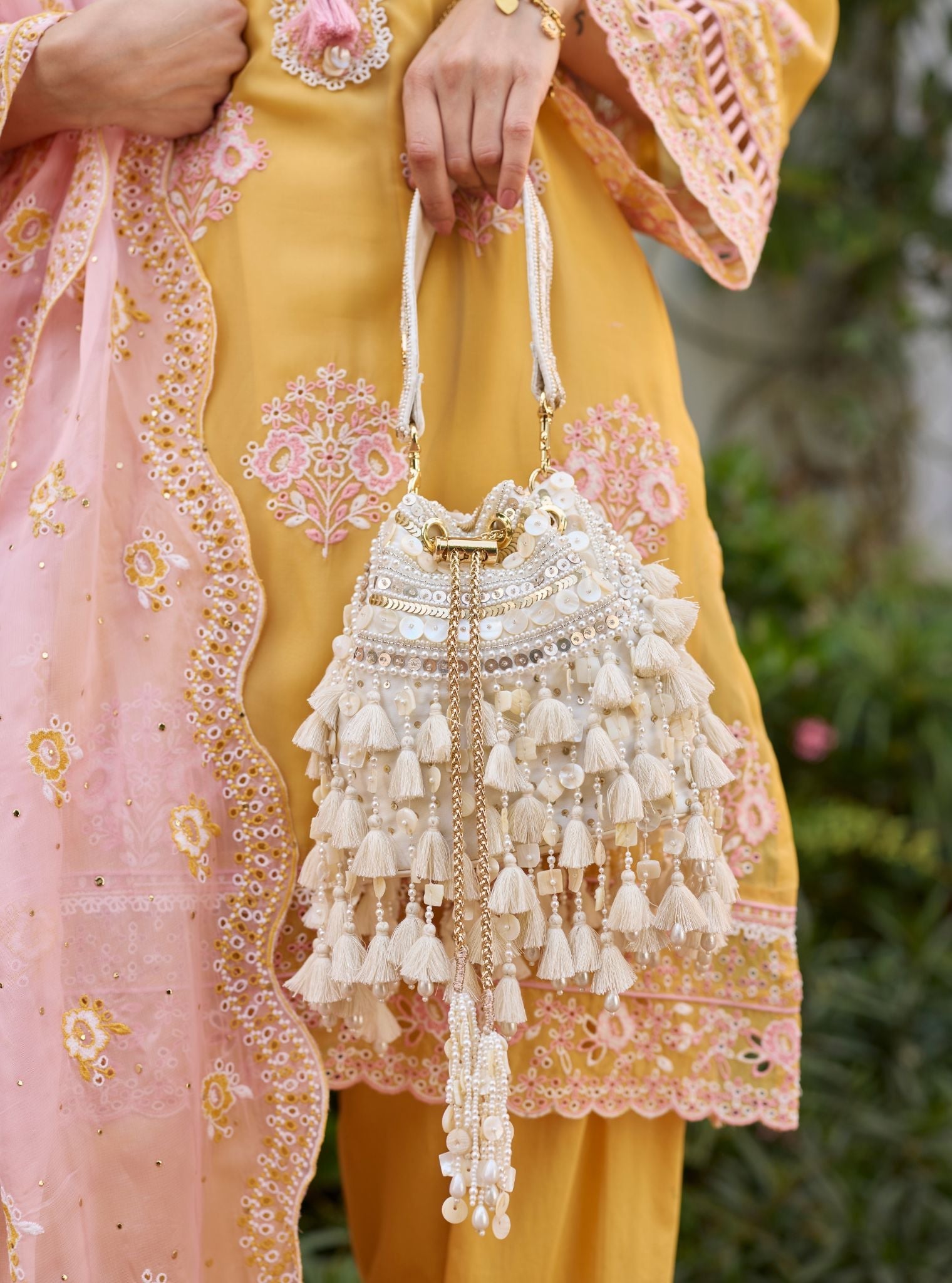 Summer Breeze White Tassels Potli Bag