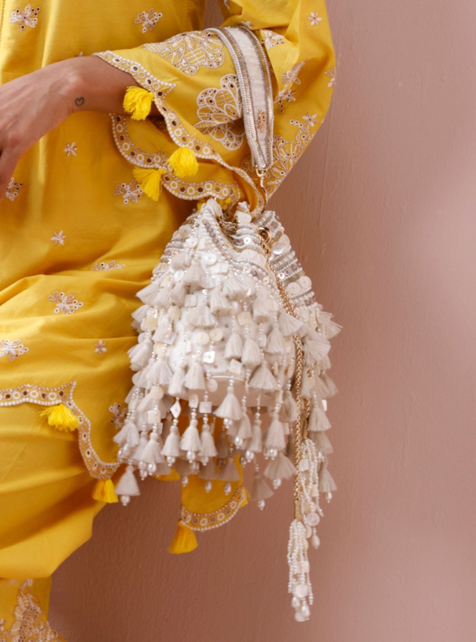 Summer Breeze White Tassels Potli Bag